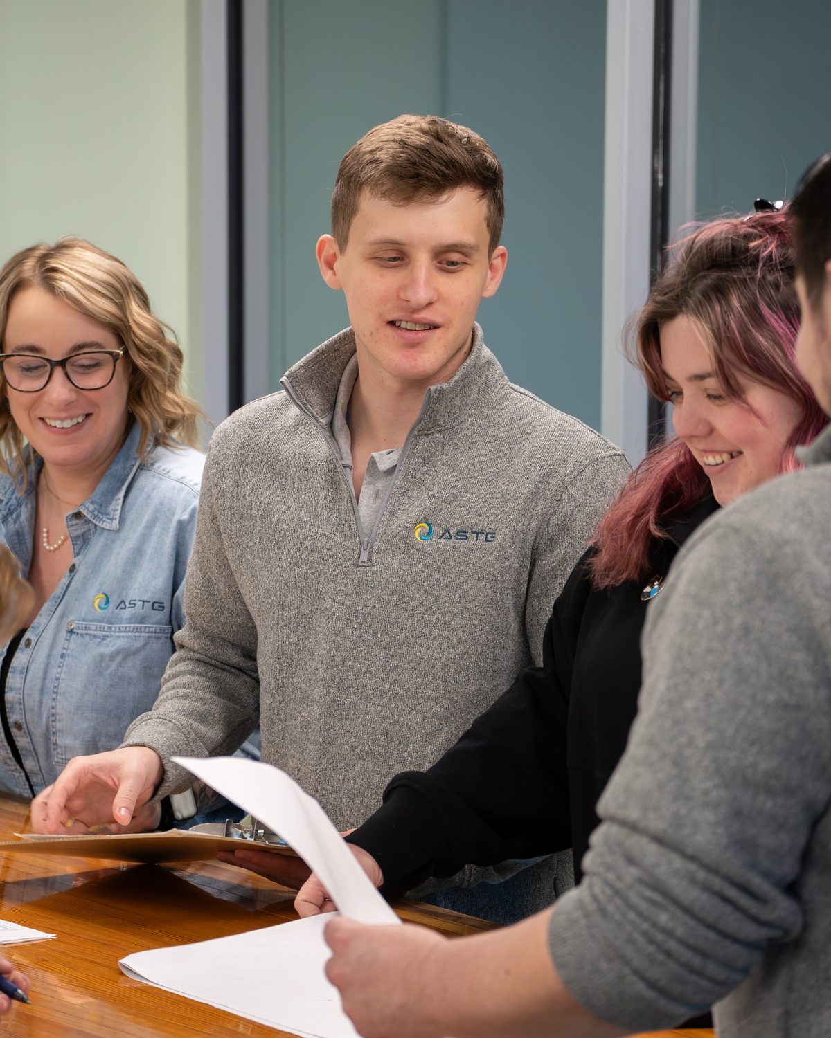 The ASTG team working together at the Newton, New Jersey headquarters